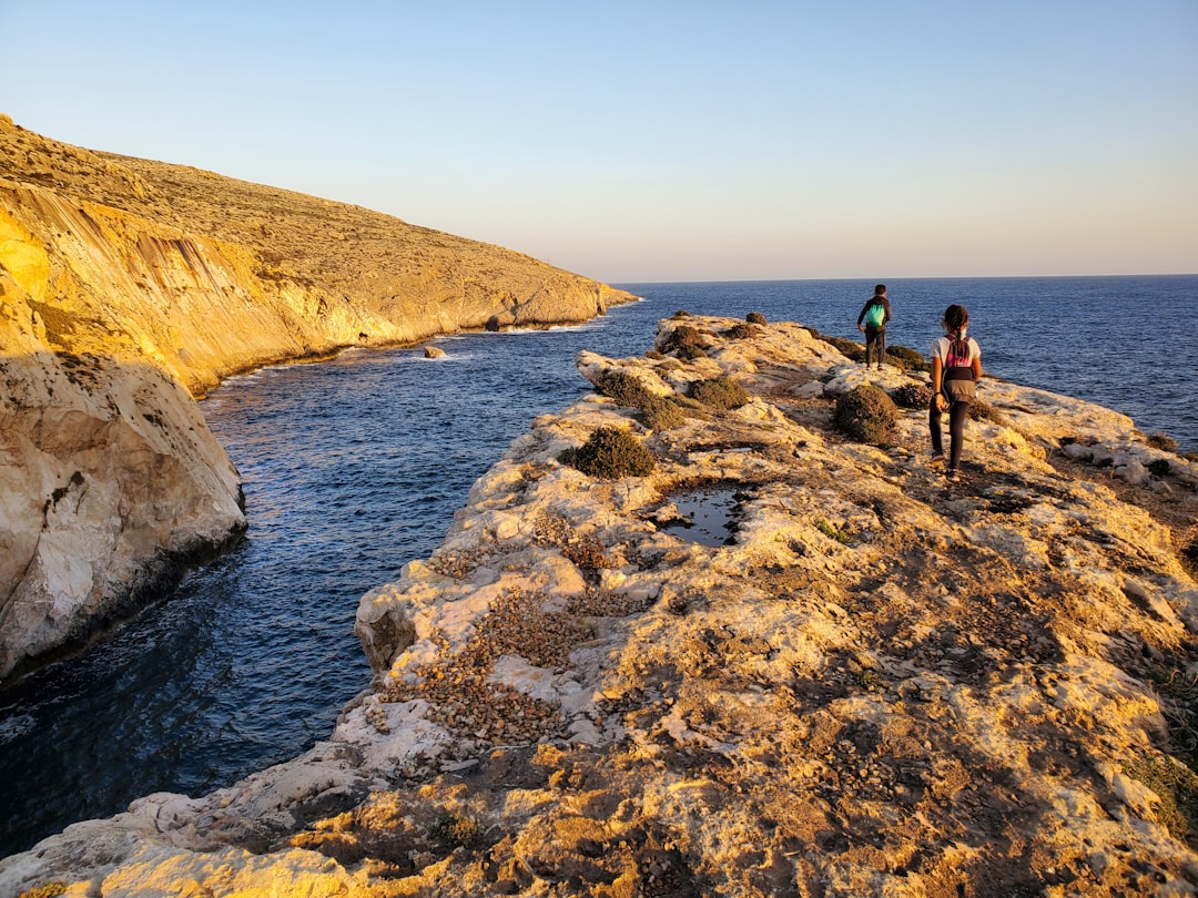 Coastal and oceanic landforms photo spot Qrendi Għajn Tuffieħa