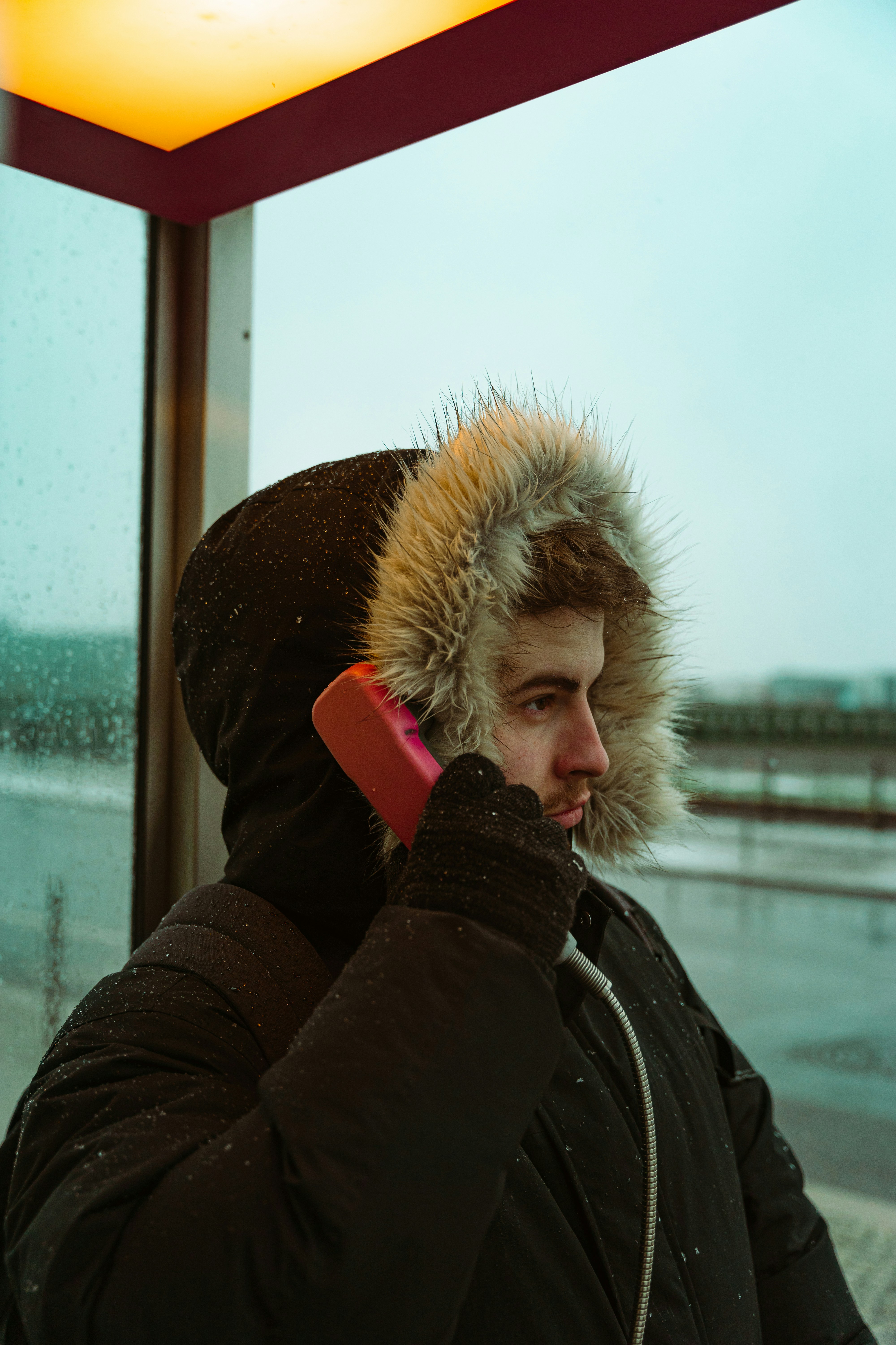 woman in black and brown parka jacket