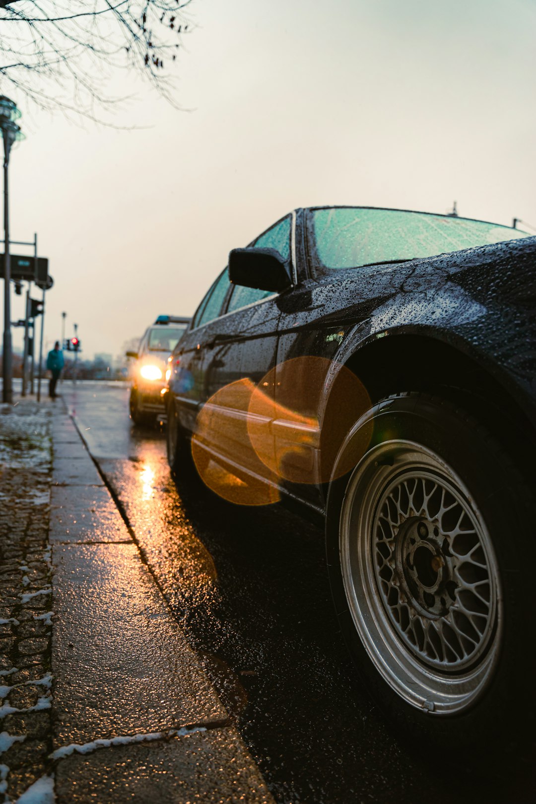 black car on road during sunset