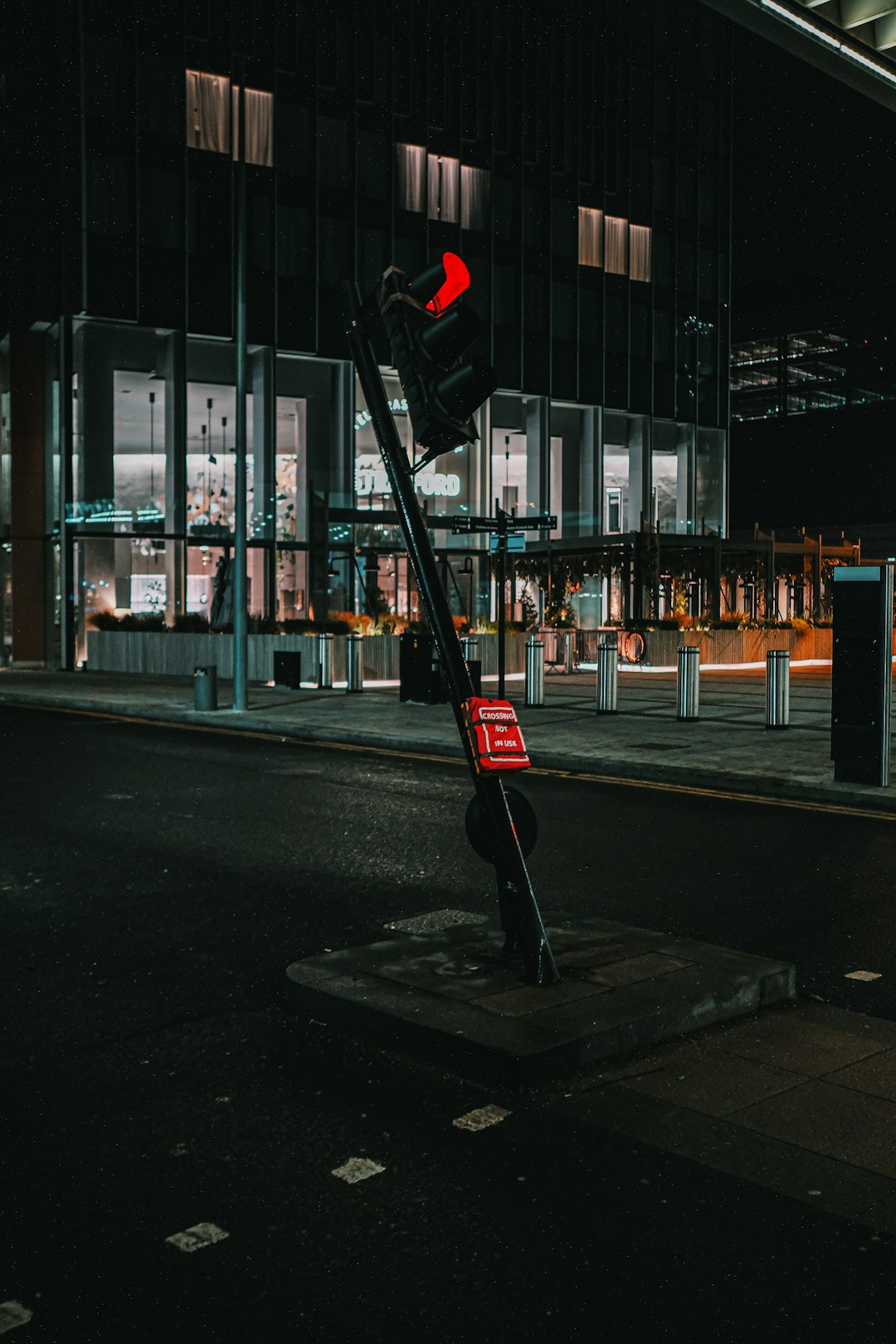 black and red street light during night time
