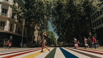 woman in black tank top and white shorts standing on basketball court during daytime