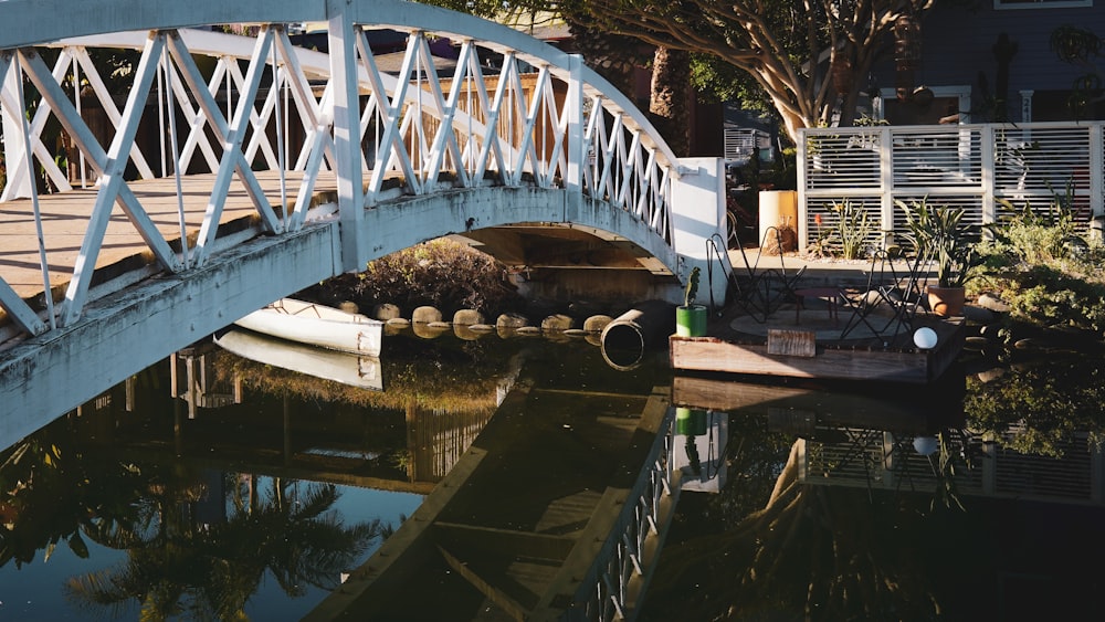 white and blue bridge over river