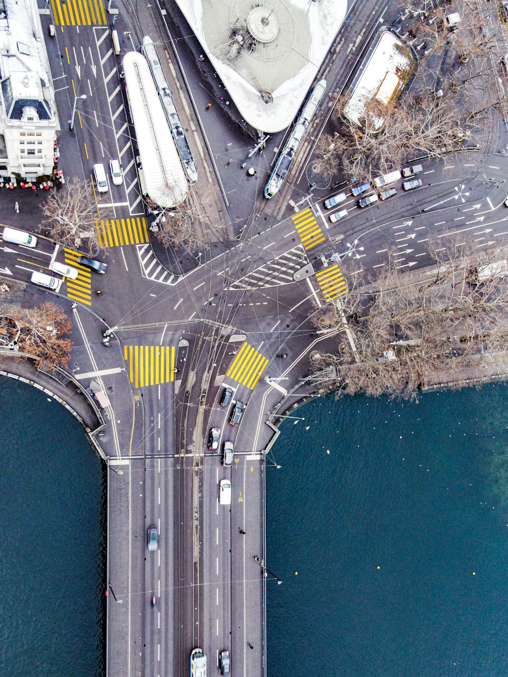 aerial view of city buildings and road during daytime