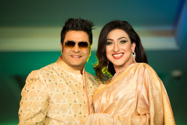 Smiling couple enjoying their special day in the bright and elegant Gangaram banquet hall.