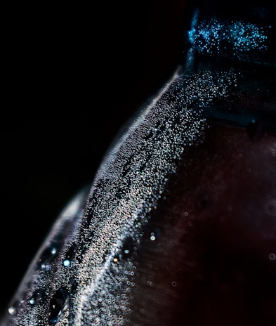 Close-up of a clear Yara Fresh water bottle with droplets of condensation.