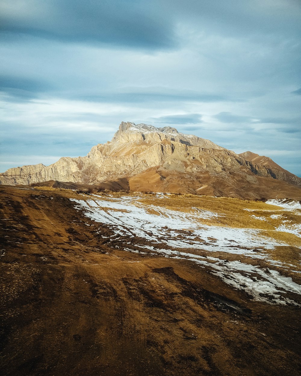 brown and gray mountain under blue sky during daytime