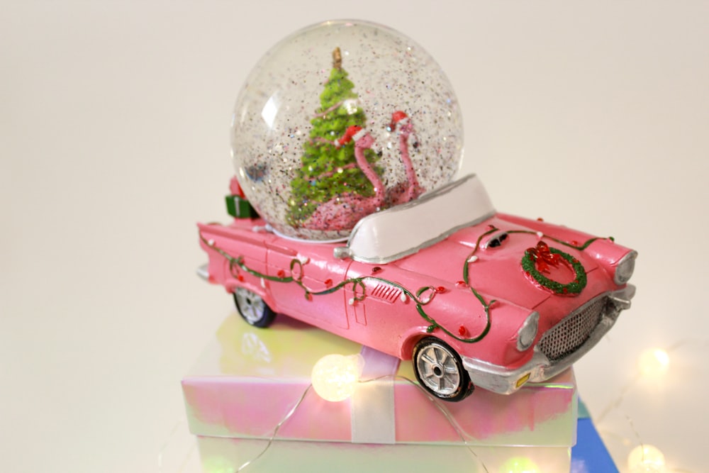 pink and white car scale model