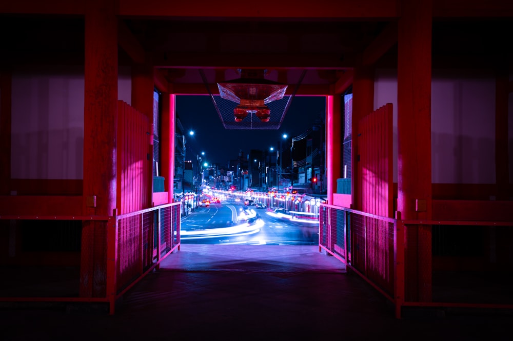 red and white tunnel with lights