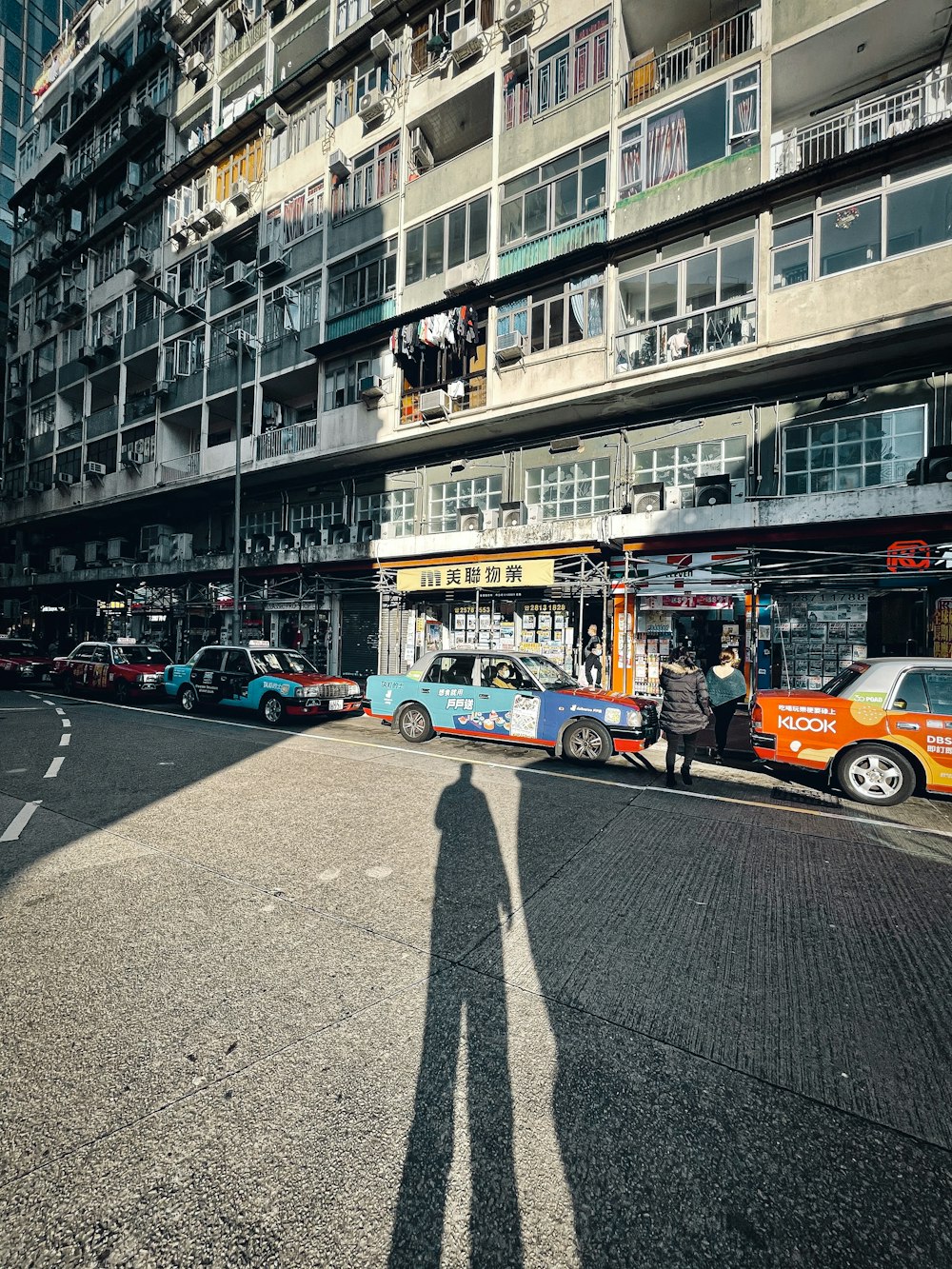 cars parked on the side of the road during daytime