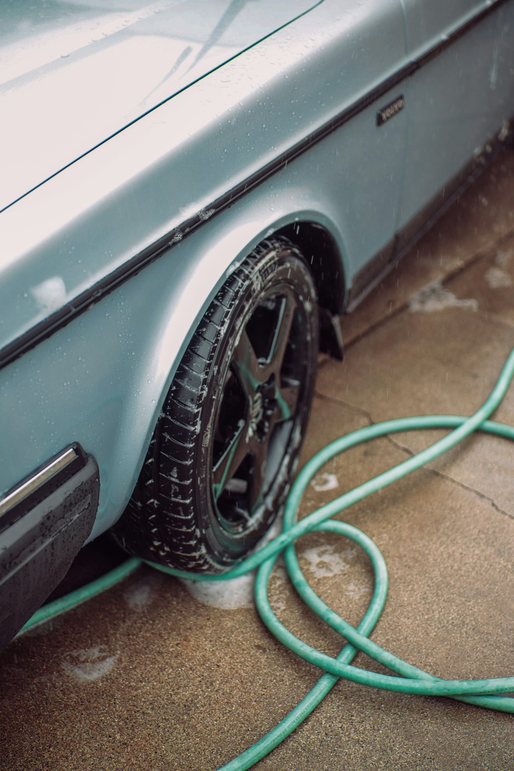 green coated wire on car