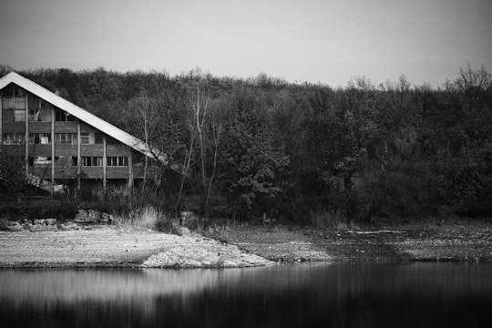 grayscale photo of house near river in Plovdiv Bulgaria