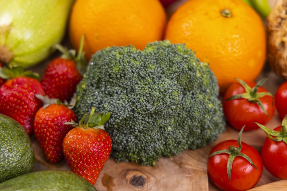 red strawberries and yellow citrus fruits