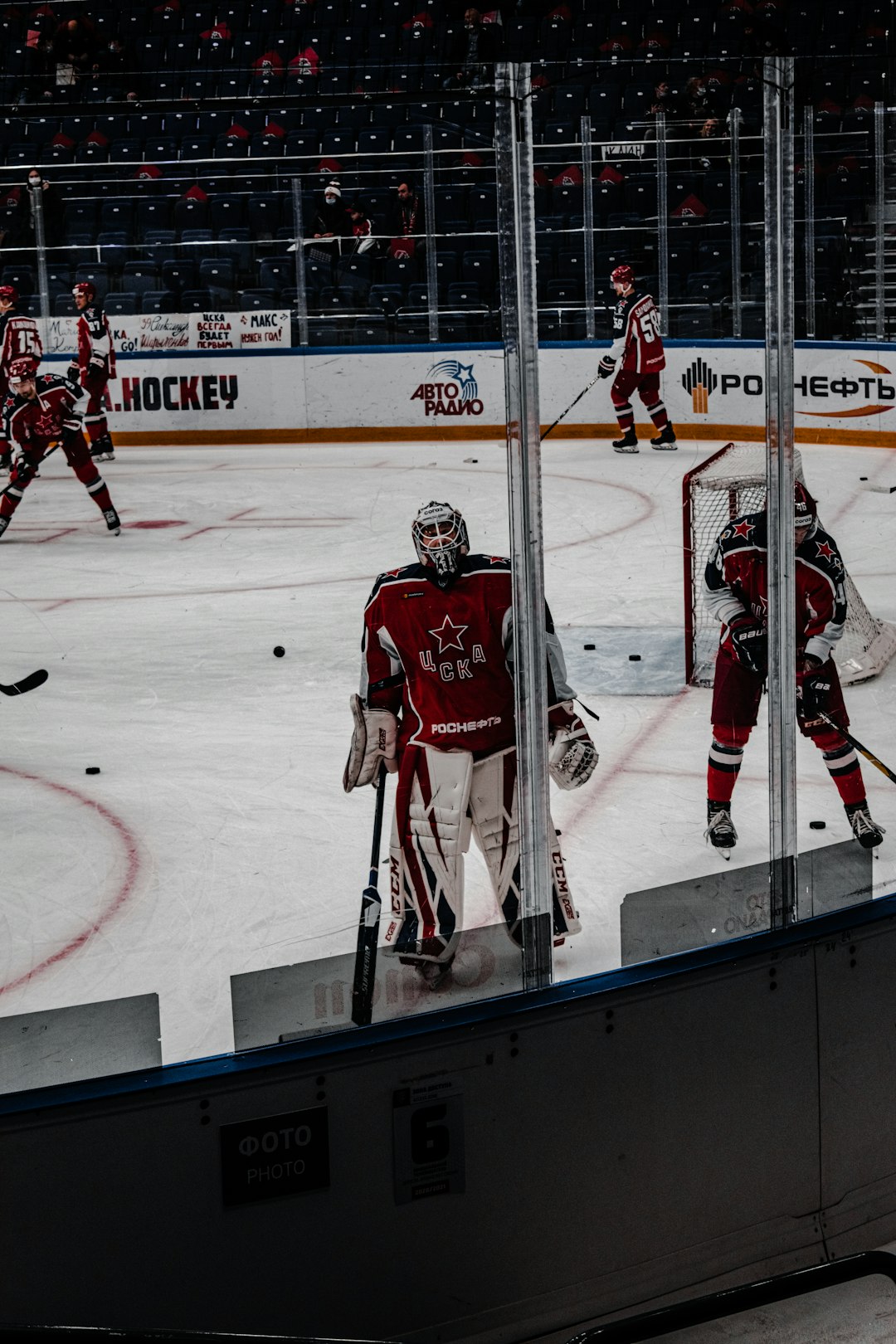 ice hockey players on ice hockey field