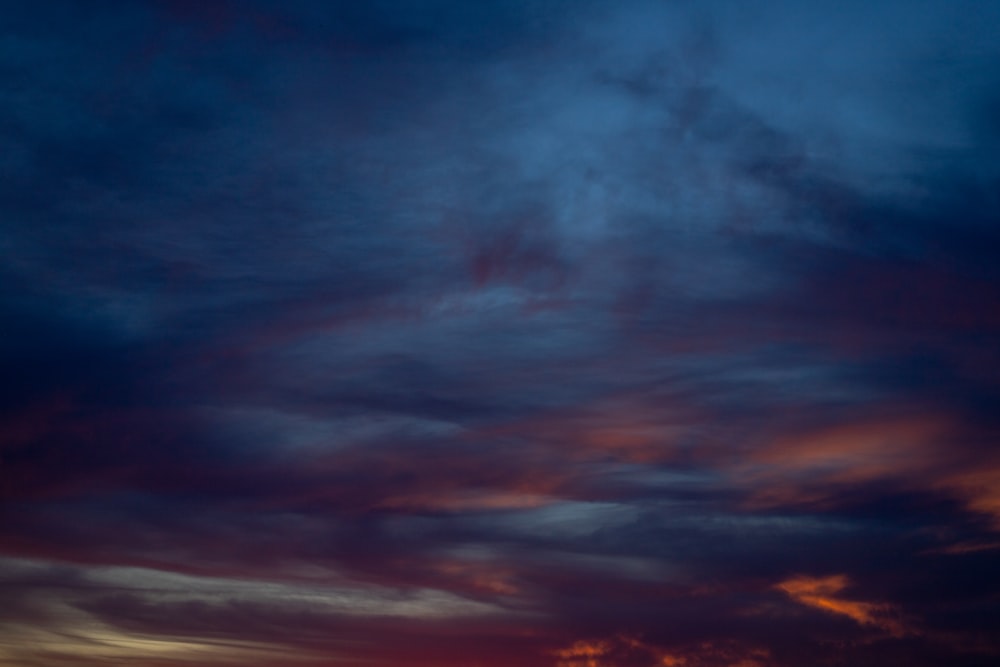 black clouds and blue sky