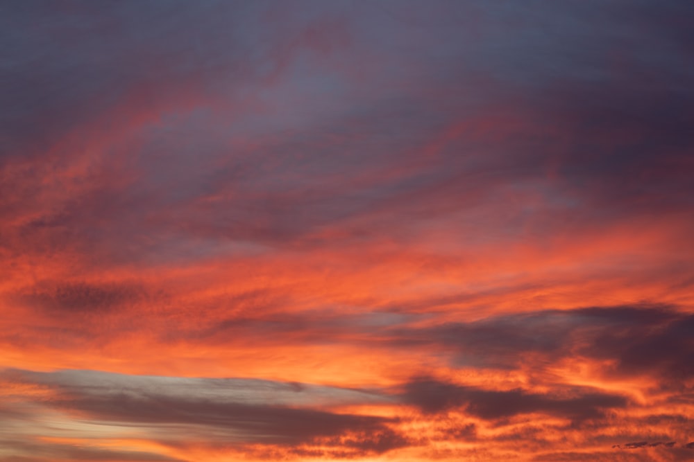 orange and blue cloudy sky during sunset