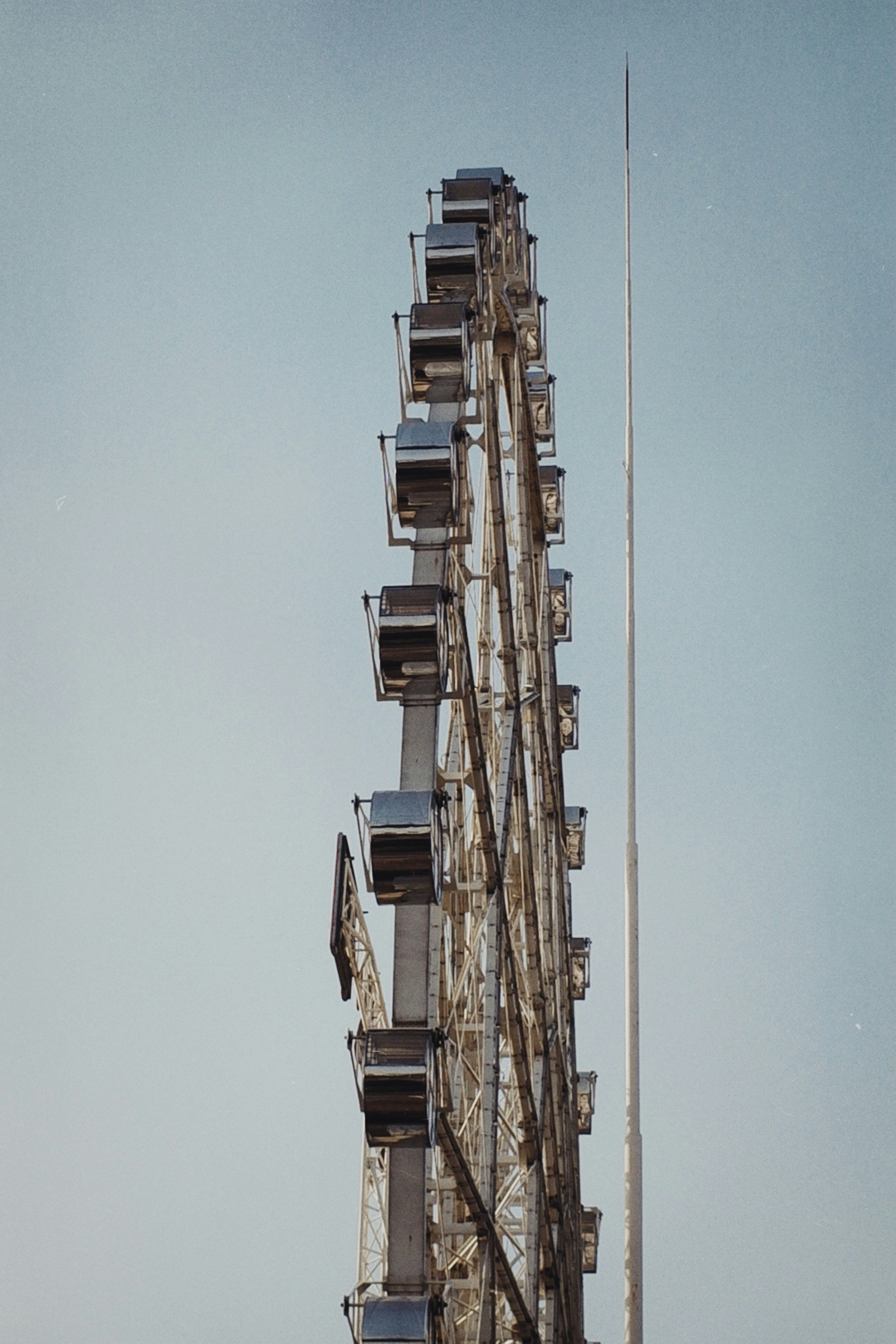 brown concrete building under blue sky during daytime