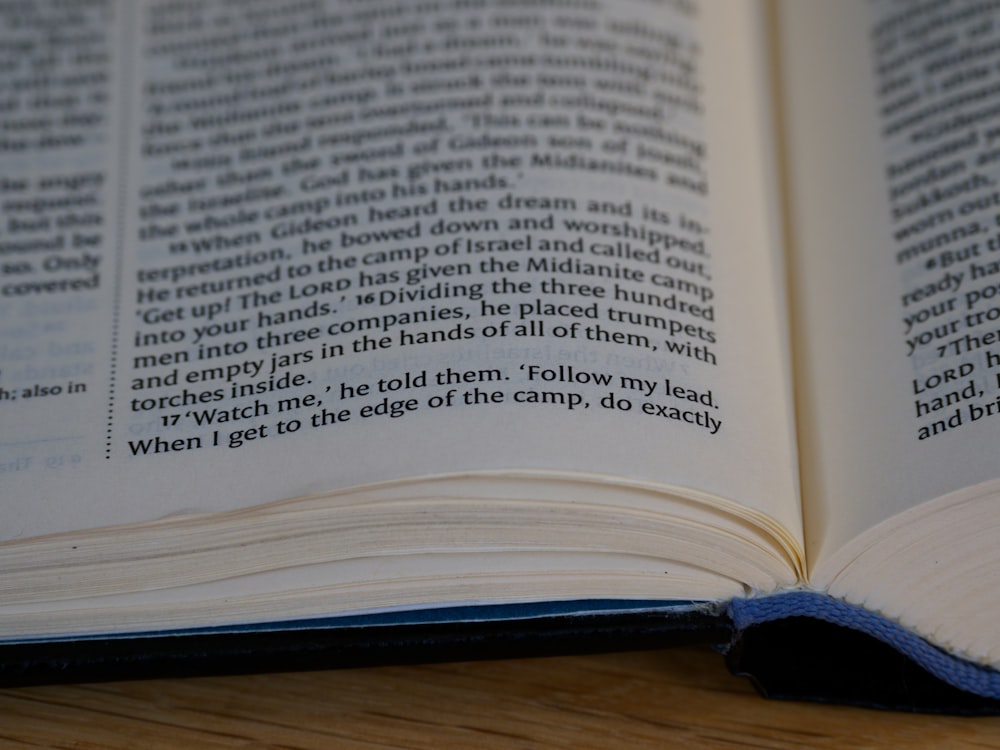 white book page on brown wooden table