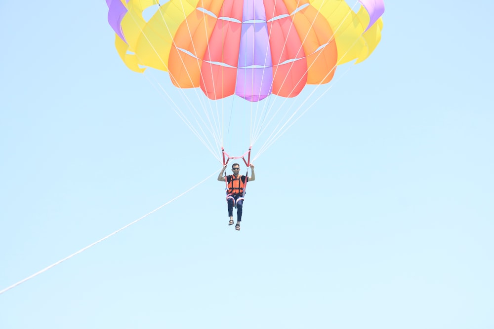 Parasailing above a boat