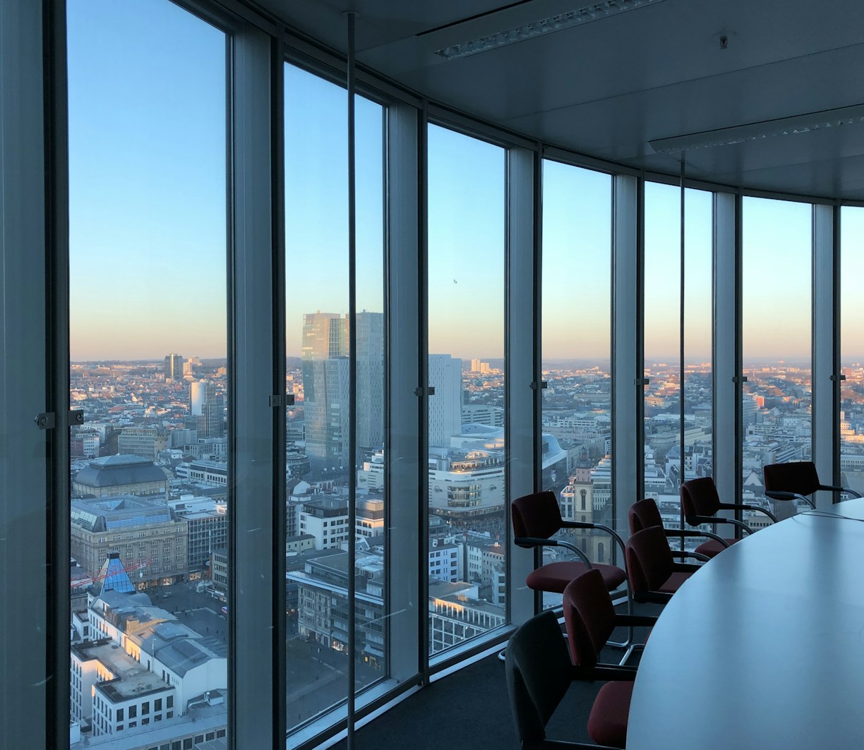 people sitting on chair near glass window during daytime