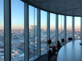 people sitting on chair near glass window during daytime