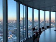 people sitting on chair near glass window during daytime