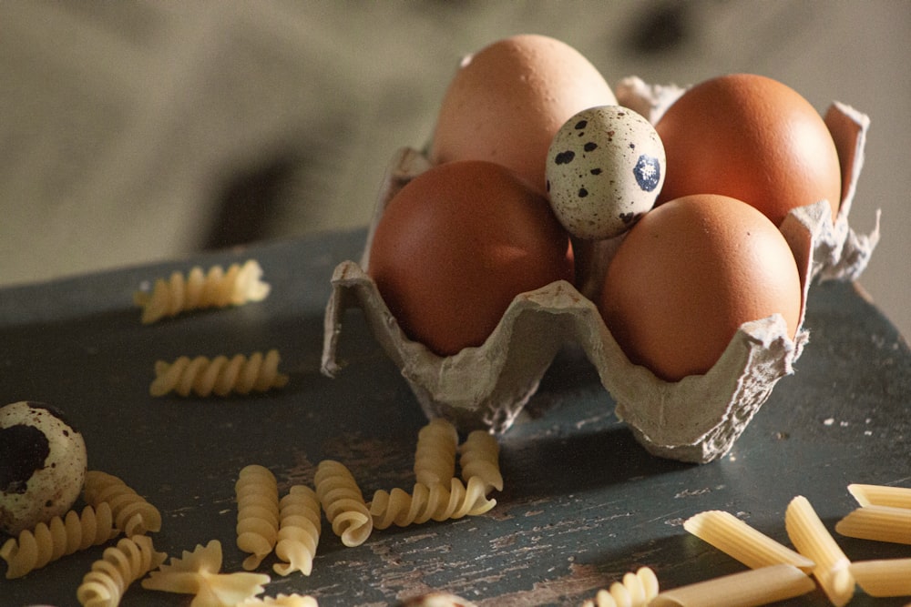 brown egg on brown wooden rack