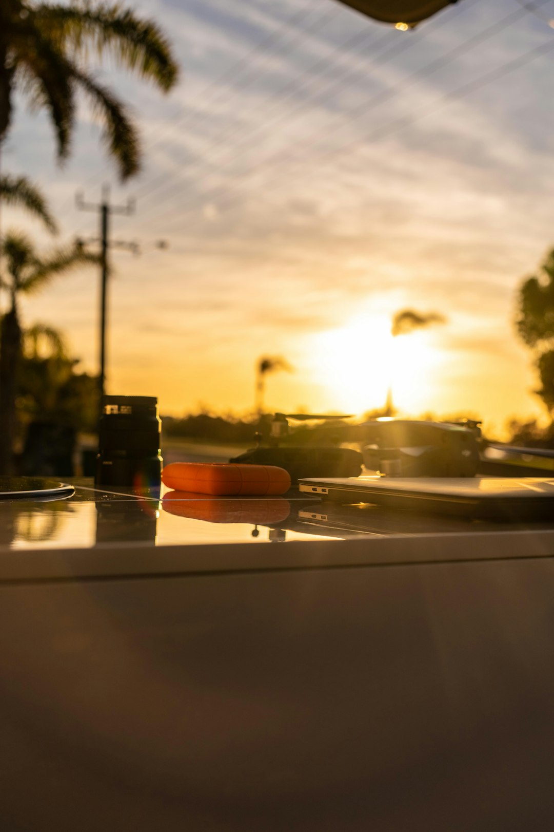 car on road during sunset