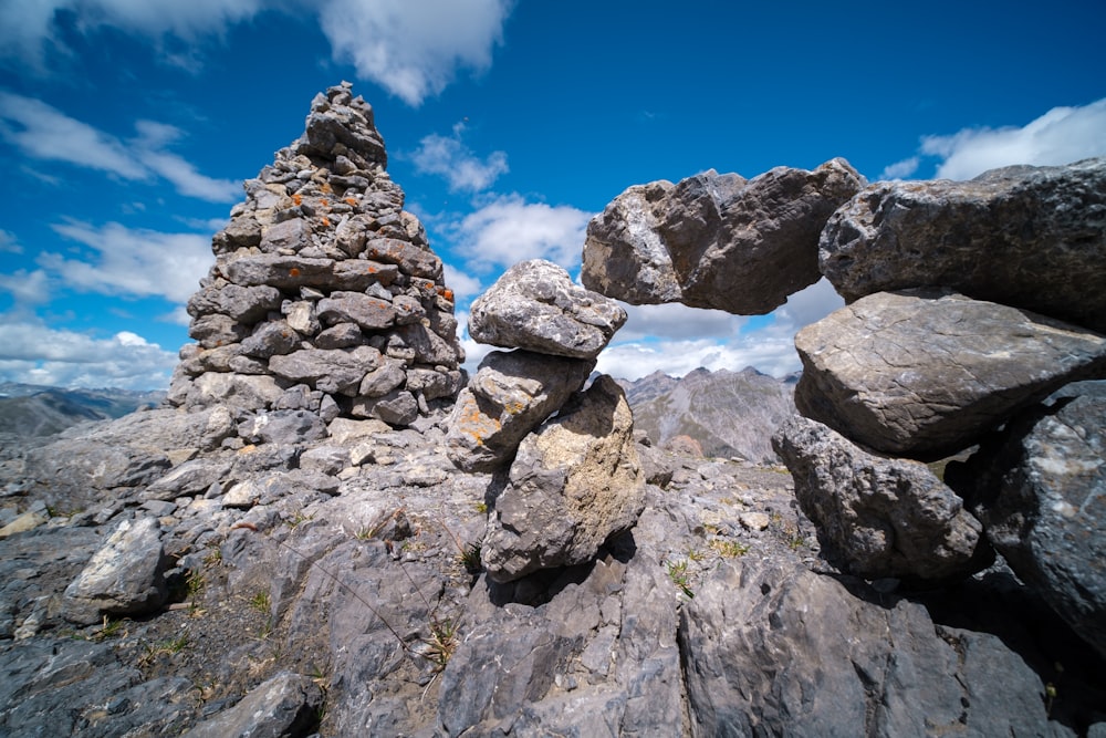 gray rocky mountain under blue sky during daytime