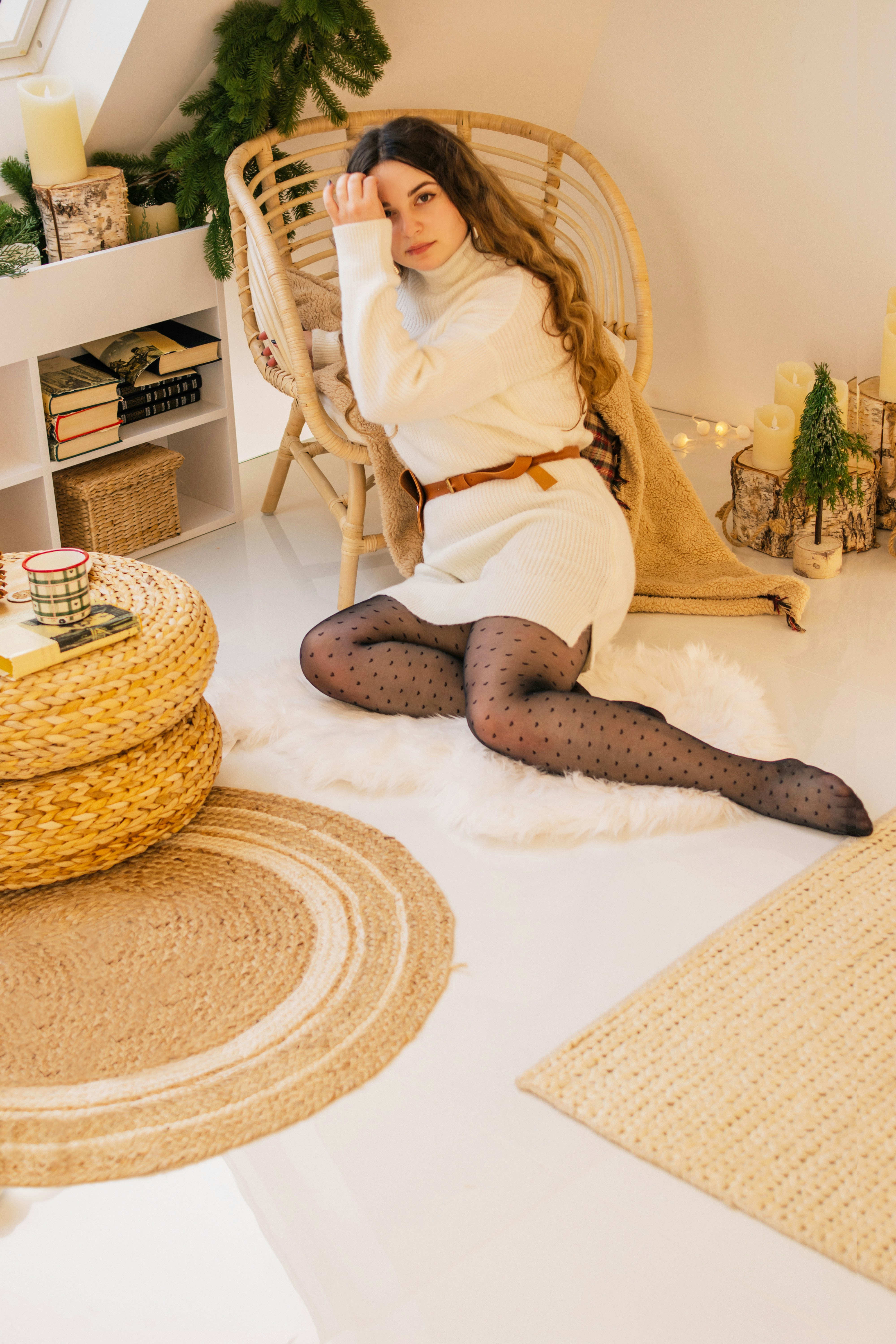 woman in white long sleeve shirt sitting on white floor photo – Free