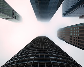 low angle photography of high rise buildings