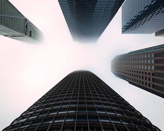 low angle photography of high rise buildings