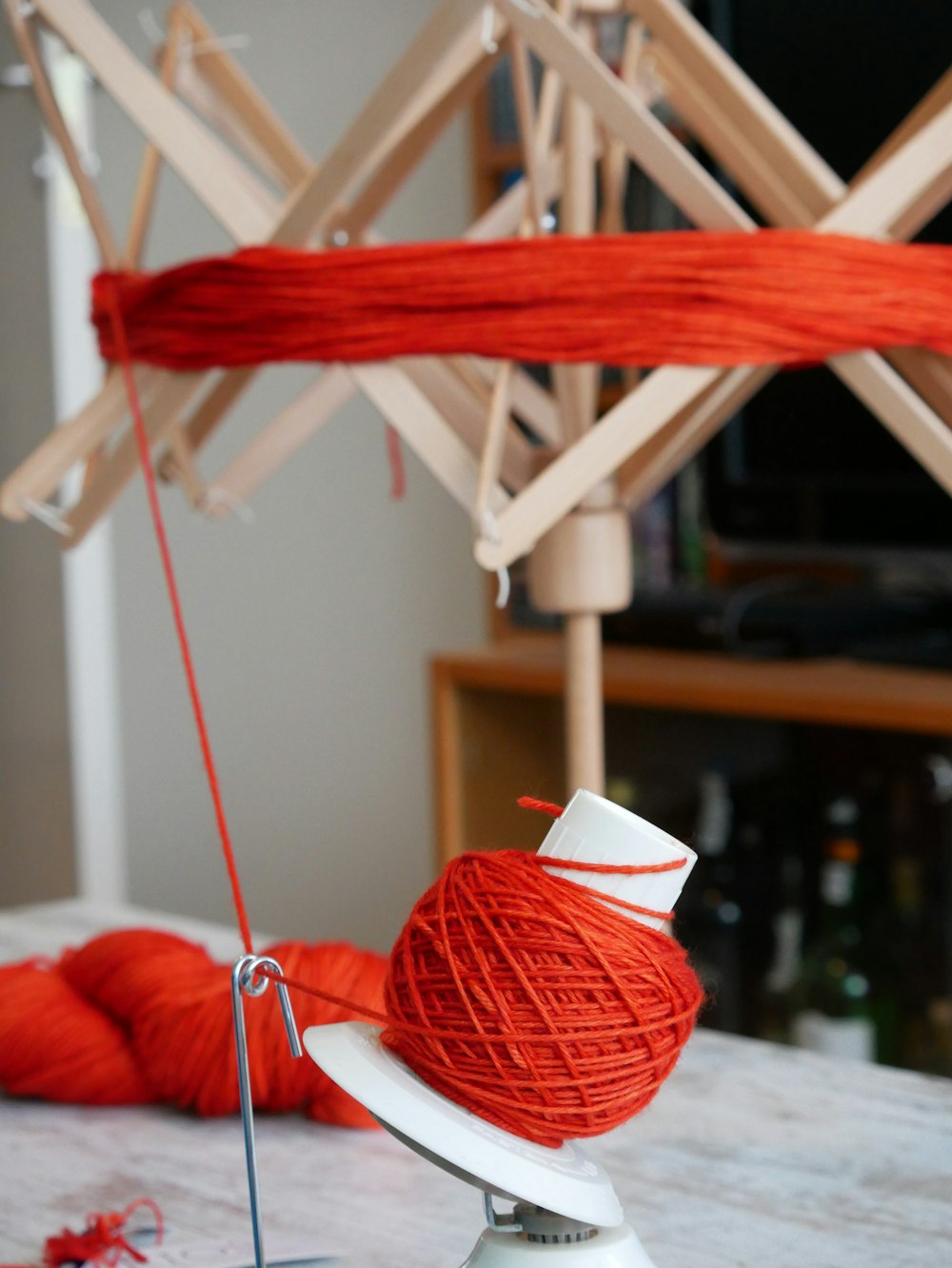 red and white umbrella on white table