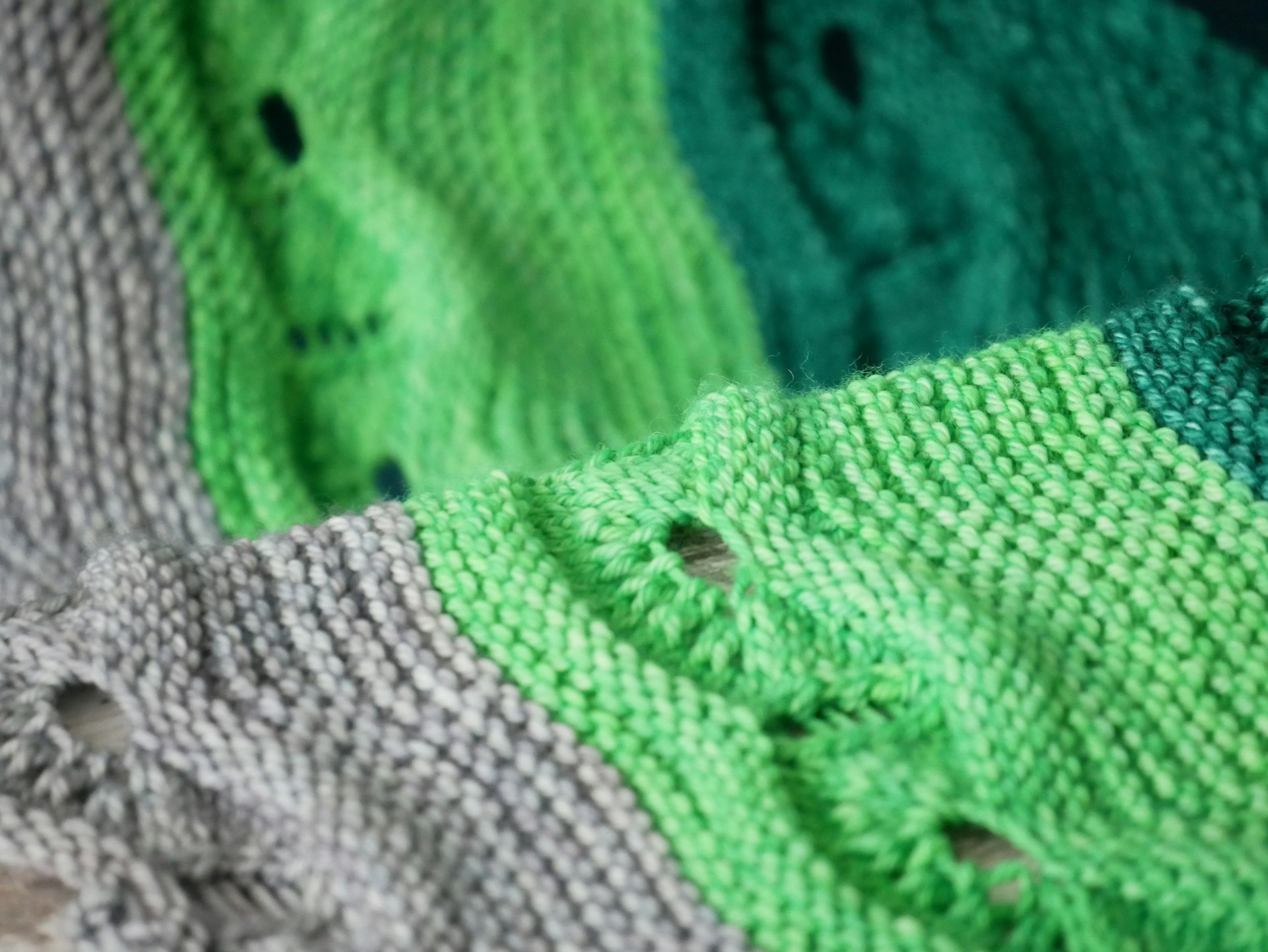 green and gray knit sweater