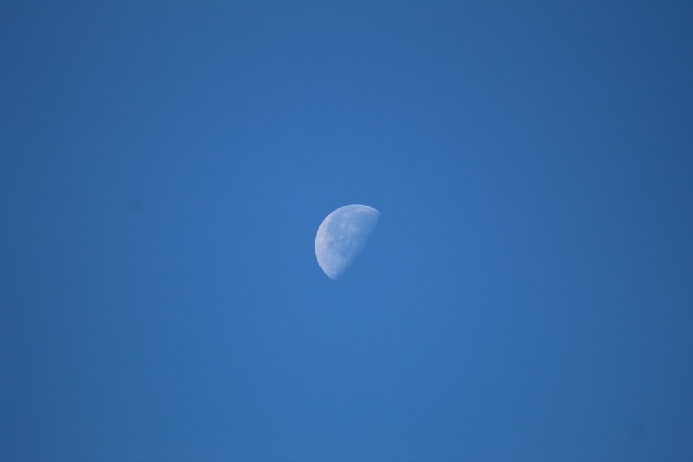 full moon in blue sky