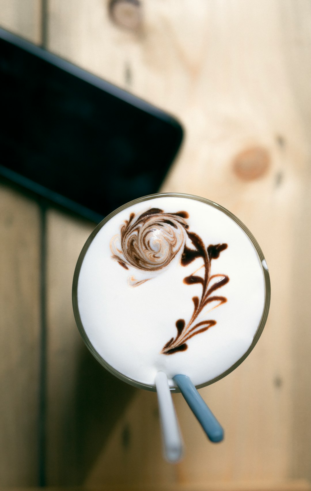 white ceramic mug with brown and white liquid