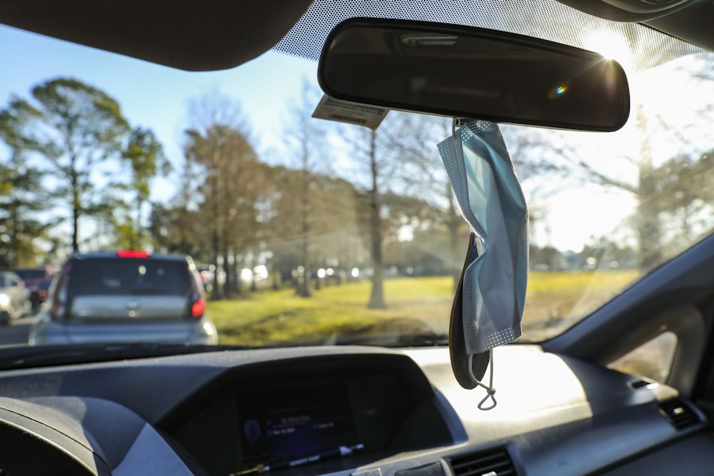 white textile on car dashboard