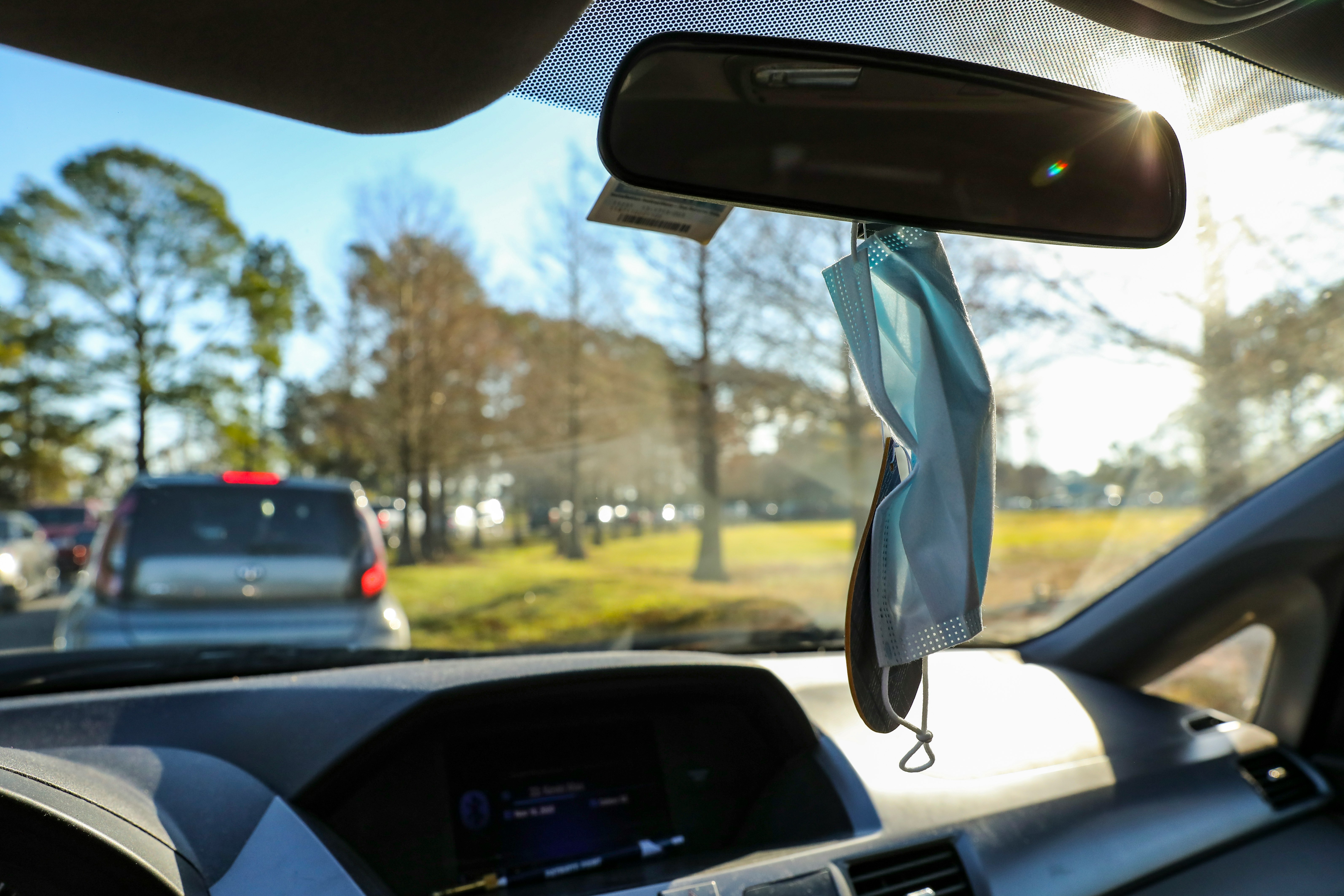 white textile on car dashboard