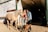 A happy customer standing next to a beautiful Arabian horse.
