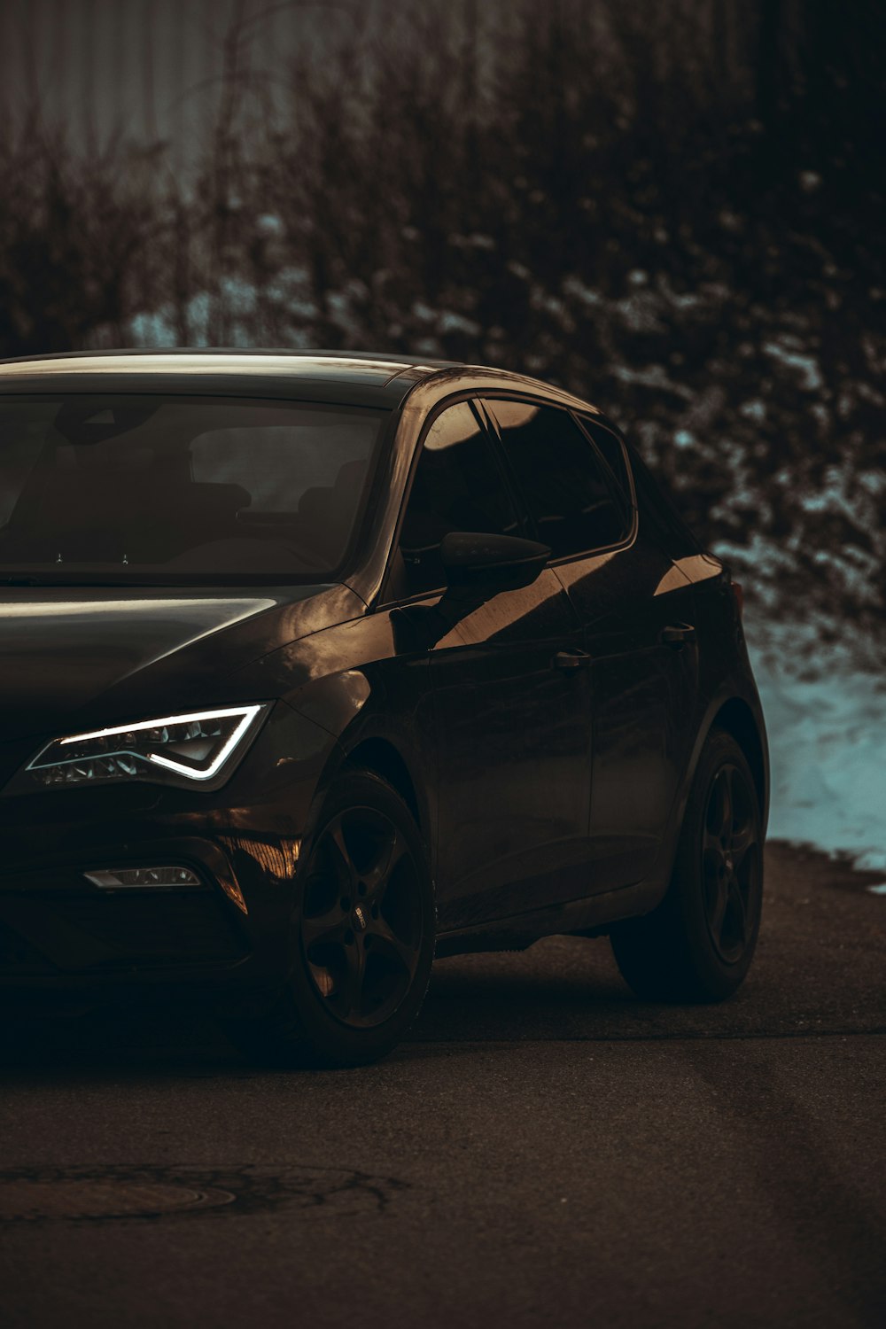 black honda sedan on gray asphalt road