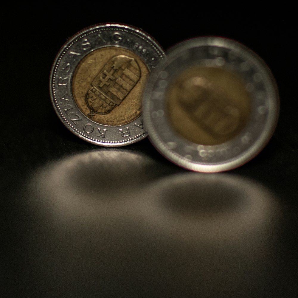 silver and gold round coins