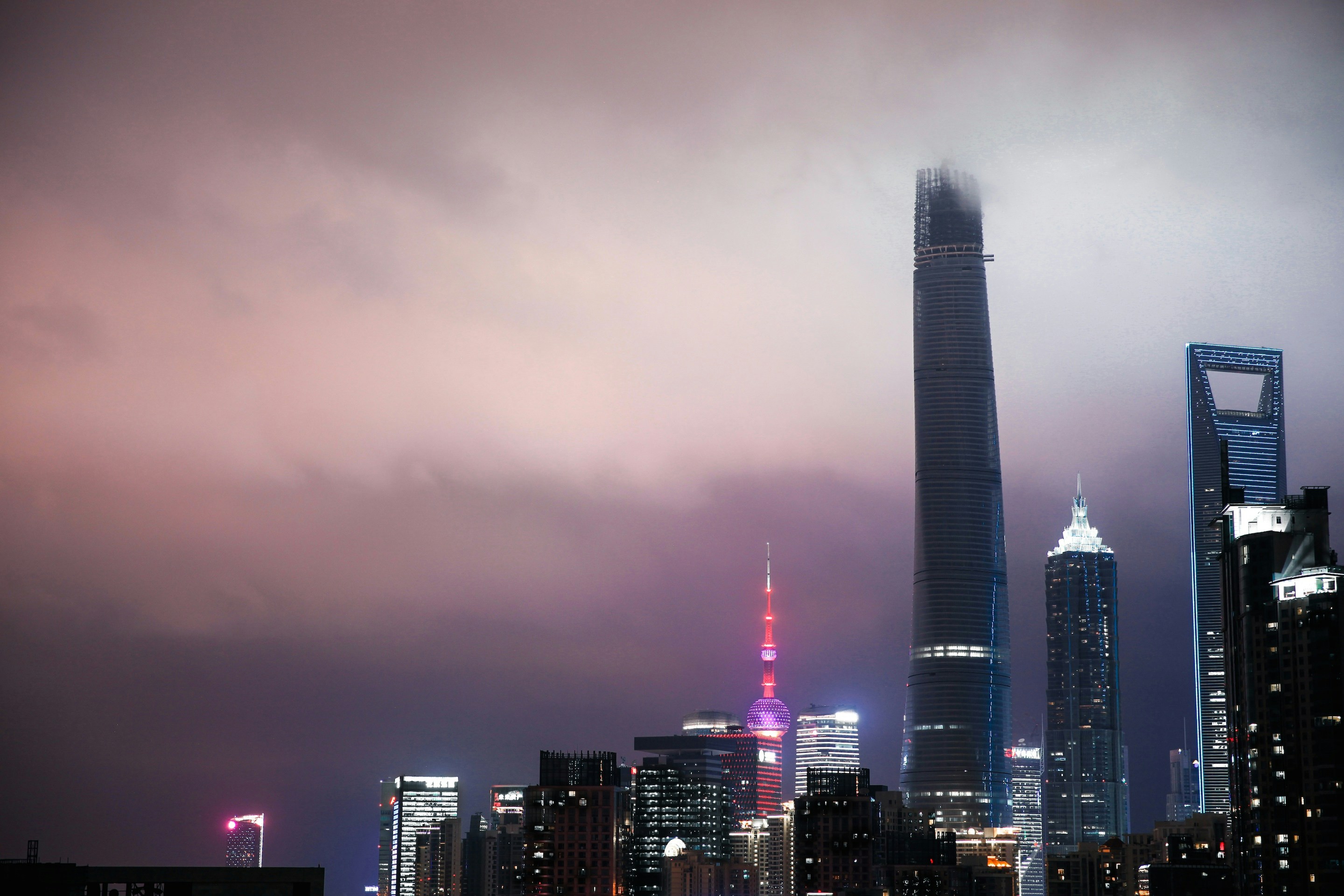 city skyline during night time
