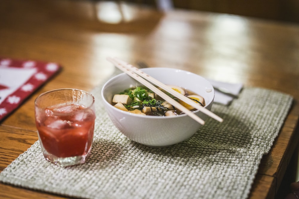 red liquid in white ceramic bowl