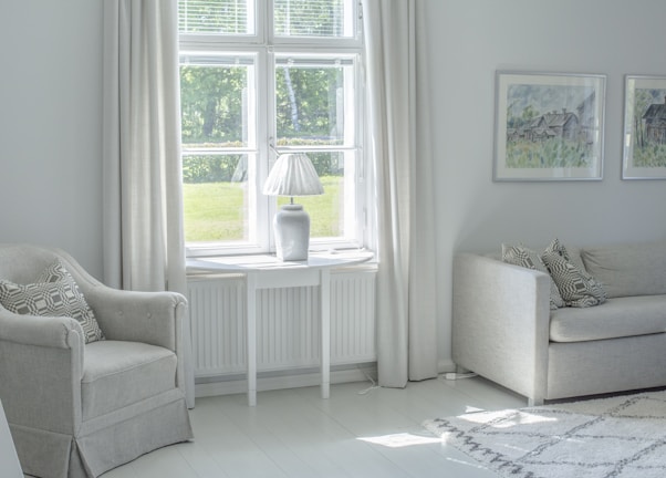 A bright living room with freshly painted walls in soft colors.