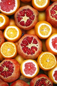sliced orange fruit on white ceramic plate