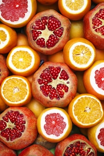 sliced orange fruit on white ceramic plate