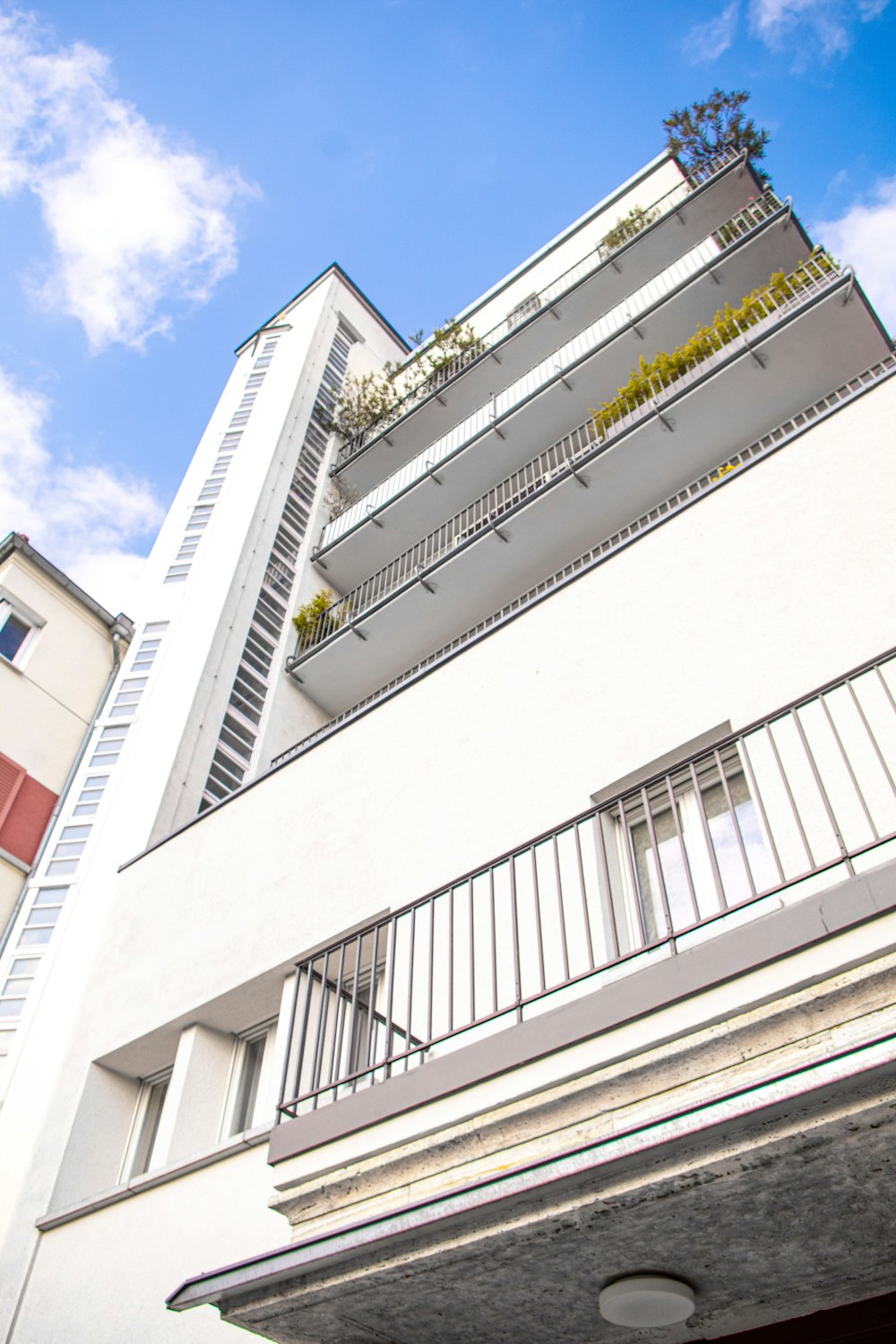 white concrete building under blue sky during daytime