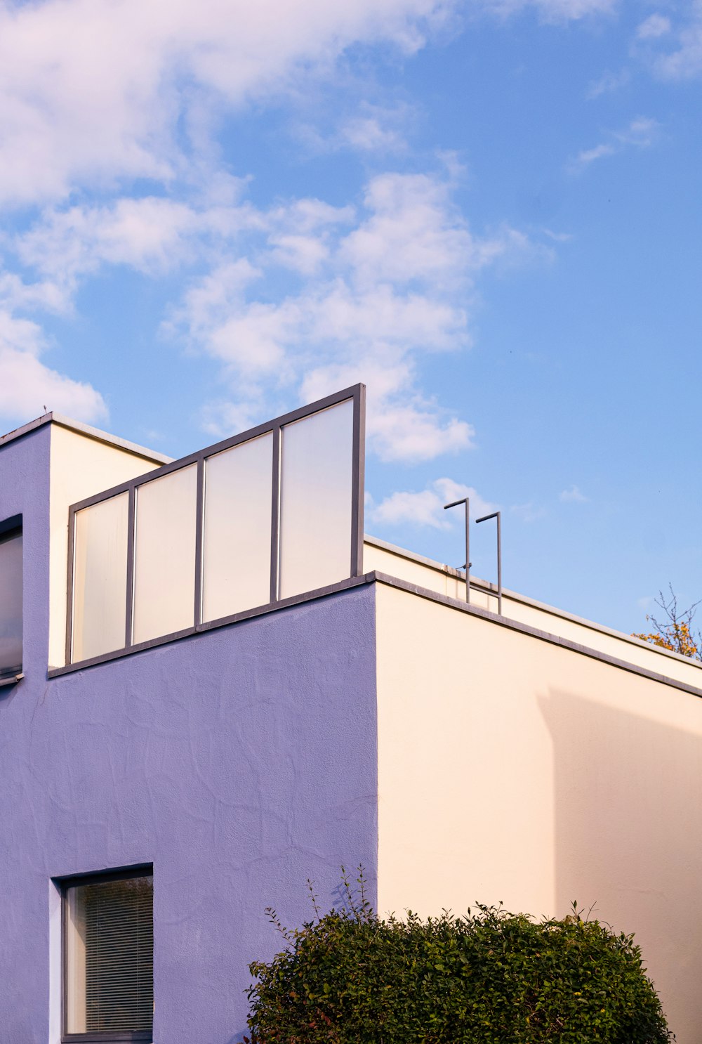 white concrete building under blue sky during daytime