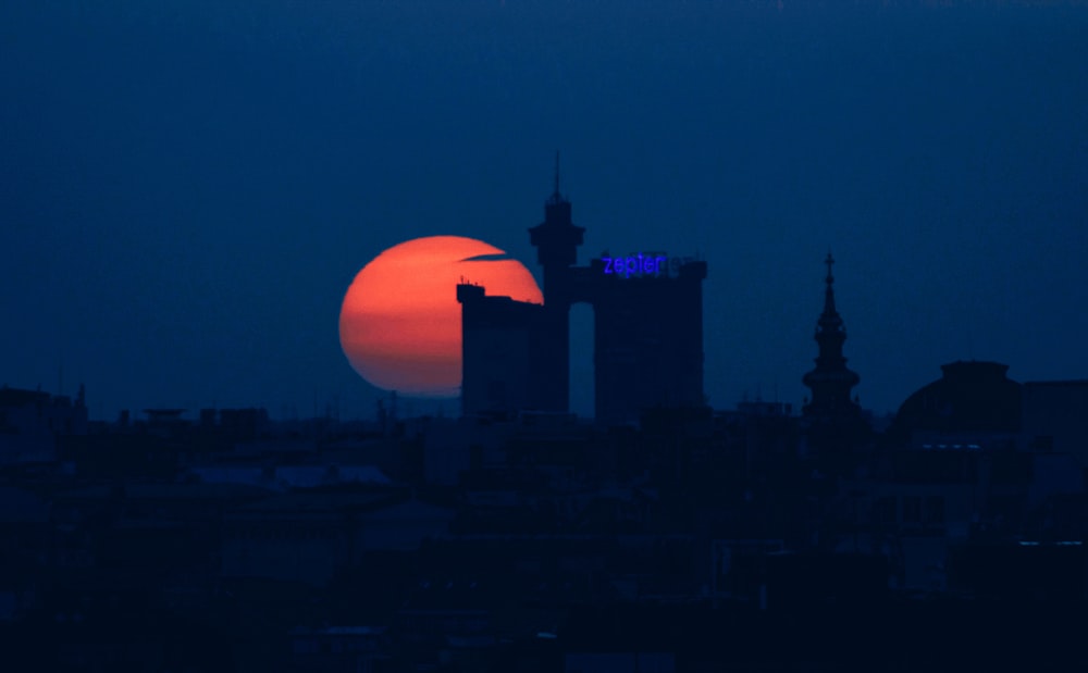 silhouette of building during night time