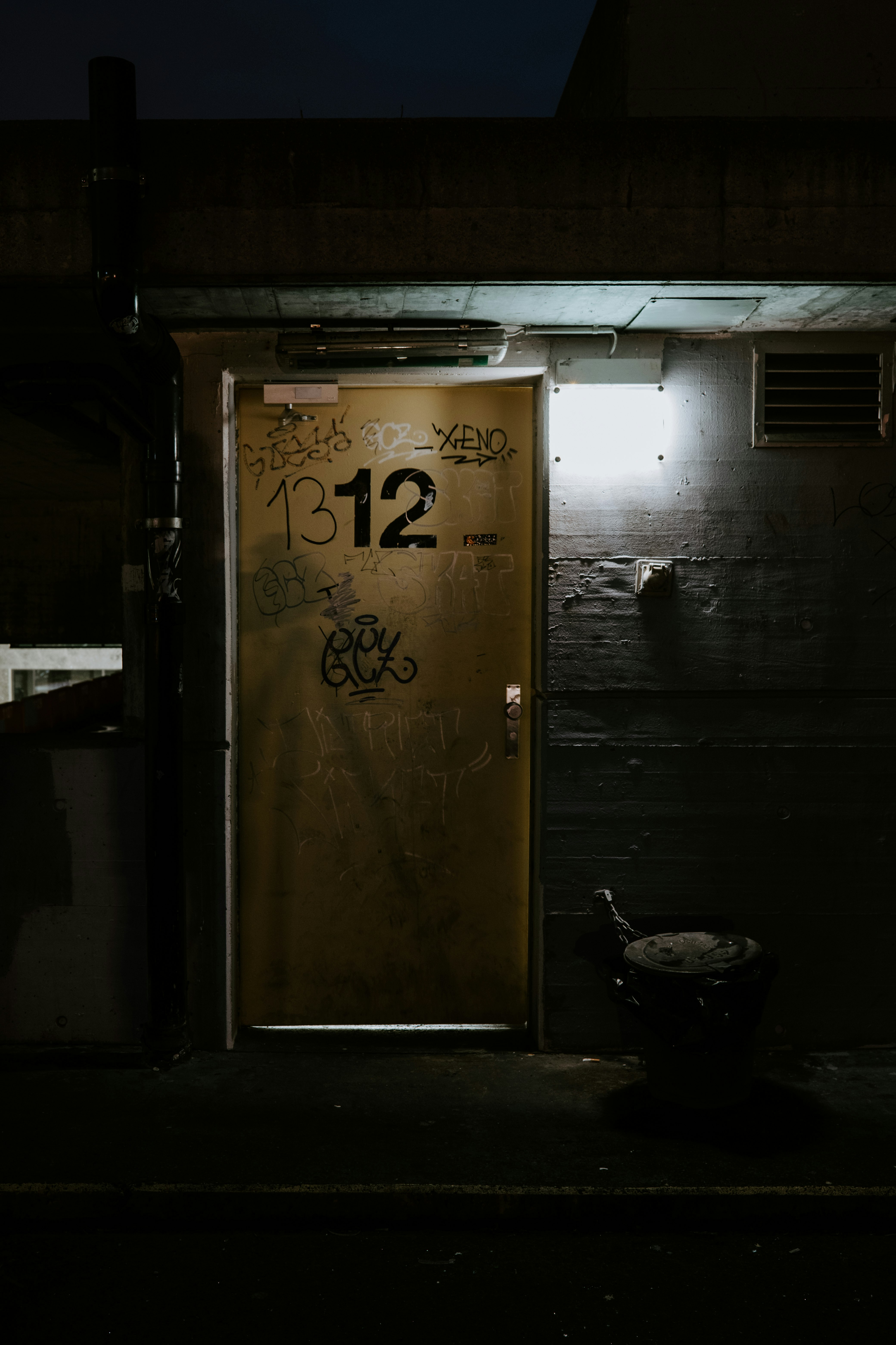 brown wooden door with black and white texts