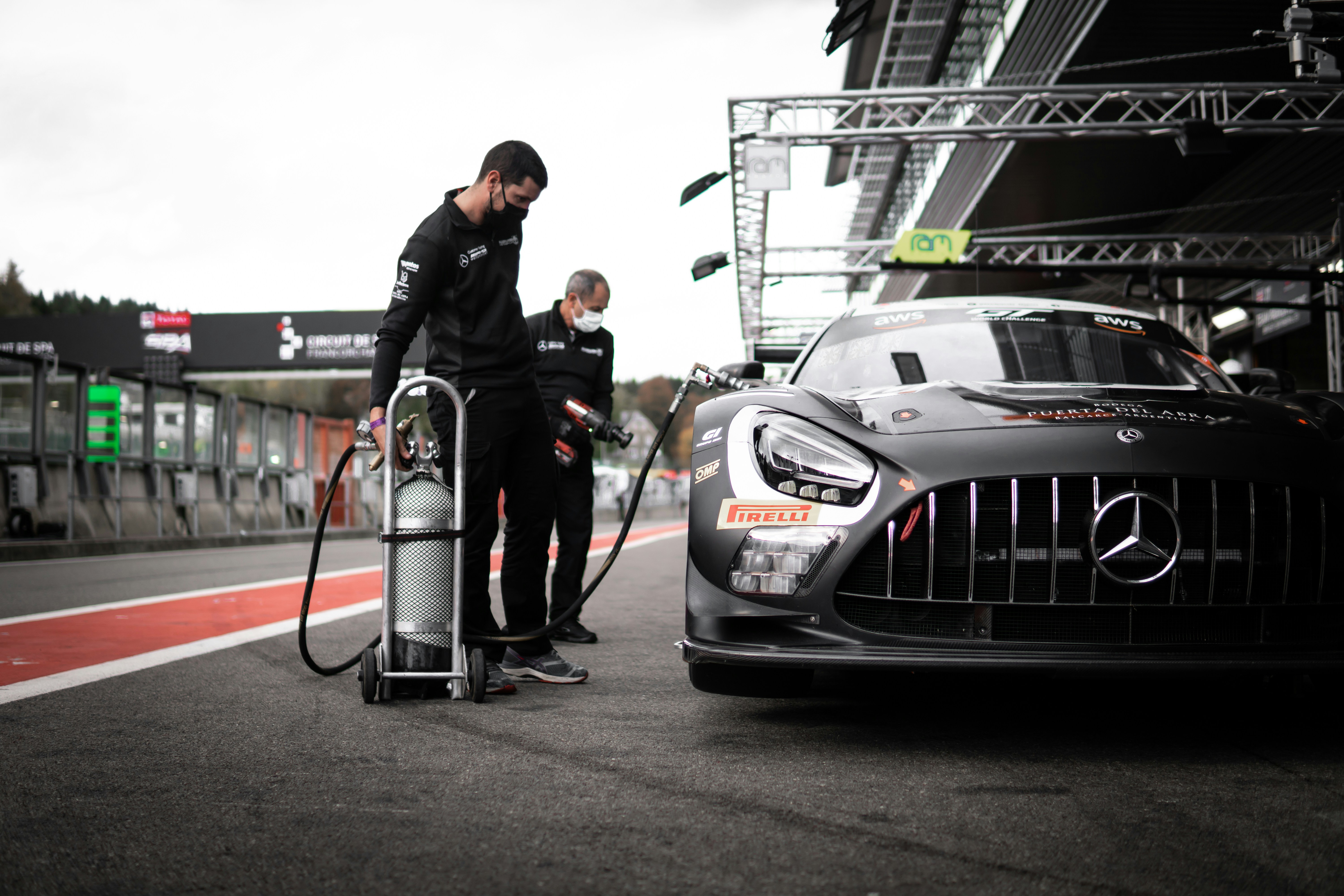 man in black jacket standing beside white bmw m 3, More at instagram.com/milancsizmadia